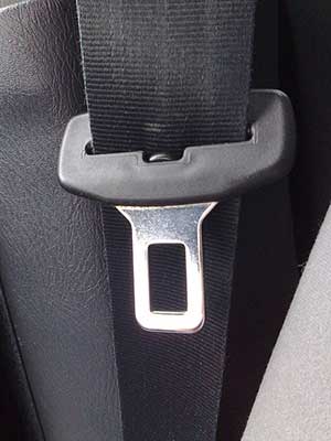 Seat belt plug